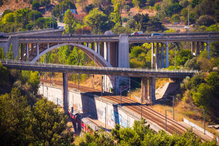 Portugal, Lisbon, October 09, 2018: Panoramic view on Lisbon. Travel Portugal. Roads and bridges in big european city.のeditorial素材