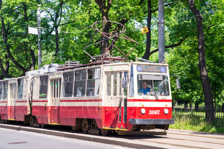 St. Petersburg, Russia, June 06, 2021. Tram goes along the street of the city.のeditorial素材