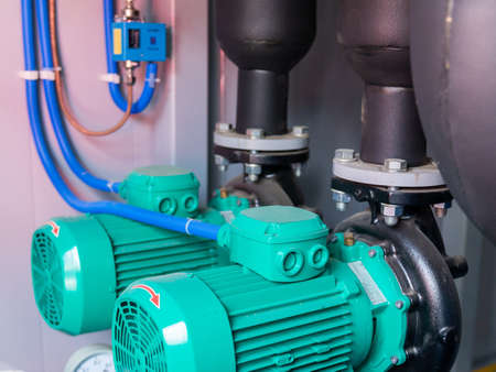 Water pumps in a large power plant or boiler room.の写真素材
