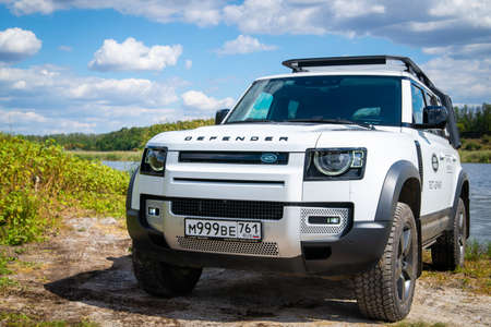 Russia, Rostovskaya oblast, 2021 June 09: Modern new SUV car Land Rover Defender, test drive in a wild. Offroad 4x4 driving adventure.のeditorial素材