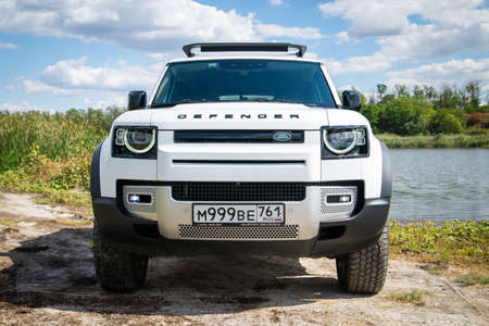 Russia, Rostovskaya oblast, 2021 June 09: Modern new SUV car Land Rover Defender, test drive in a wild. Offroad 4x4 driving adventure.のeditorial素材