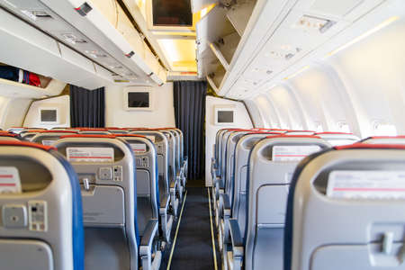 Empty passenger airplane seats in the cabin.の写真素材