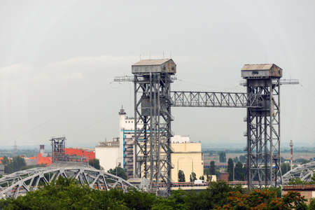 Towers of a rising steel bridge. industrial landscape.の写真素材