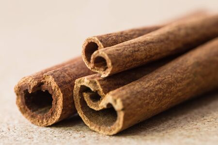 Ð¡innamon sticks on corkwood background, close-up shotの写真素材