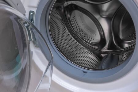 Washing machine drum close up, front view.の写真素材