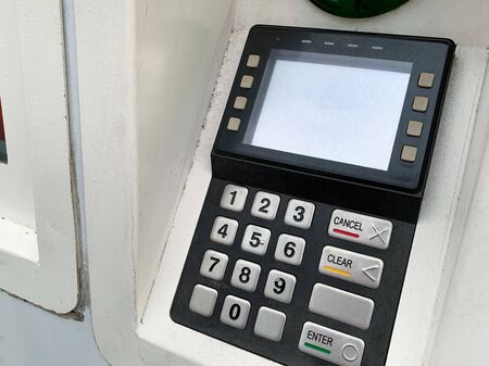 Parking payment terminal on the city street close up, modern technology for payment using credit...