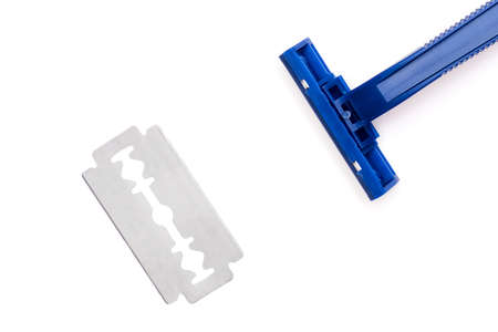 Blue disposable safety plastic razor and dangerous metallic classic razor blade on white background, cutting, removing unwanted hair in underarms or legsの写真素材