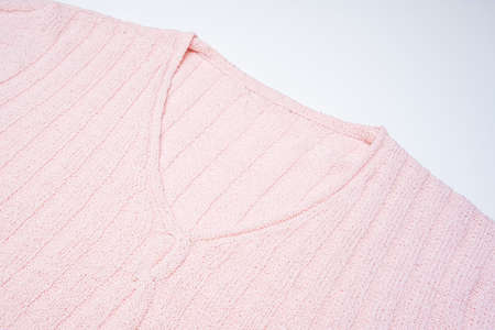A cozy knitted sweater, pullover on white background, winter sale concept.の写真素材