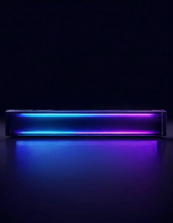 Neon-lit futuristic electronic device on dark backgroundの素材