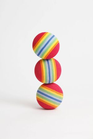 3 foam balls stacked on top on one another on a white background.
