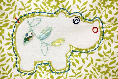 Patchwork design of a rhinoceros on a blanketの写真素材
