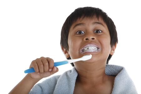 A young boy brushing his teethの写真素材