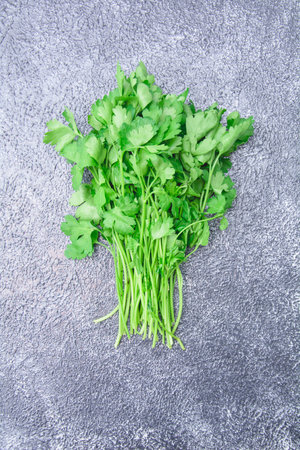 Beautiful juicy fresh fragrant bunch of delicious parsley