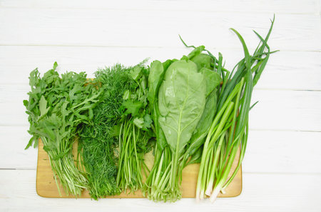 Beautiful juicy fresh fragrant bunch of delicious salad greens