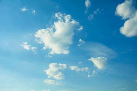 Beautiful aerial sky with big cute romantic blue cloudsの写真素材