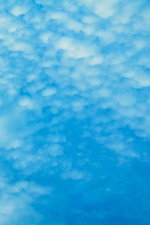 Beautiful aerial sky with big cute romantic blue clouds