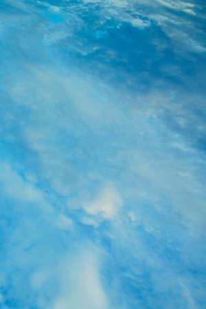 Beautiful aerial sky with big cute romantic blue cloudsの写真素材
