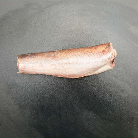 Delicious fresh hake fish for cleaning in the kitchen