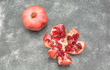 Delicious juicy ripe pomegranate fruit close upの写真素材