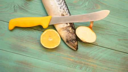 Cooking pickled mackerel for bakingの写真素材