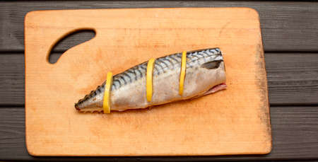 Cooking pickled mackerel for bakingの写真素材