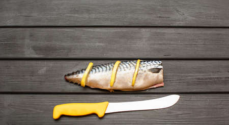 Cooking pickled mackerel for bakingの写真素材