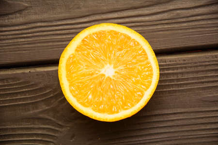 Juicy ripe delicious lemon on a light backgroundの写真素材