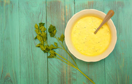 Cooked homemade mayonnaise on a plate on the tableの写真素材