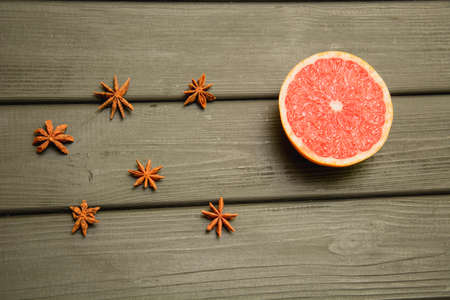Juicy ripe delicious grapefruit on a dark backgroundの写真素材
