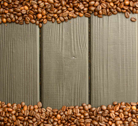 Delicious custard coffee in cups on the background of coffee beansの写真素材