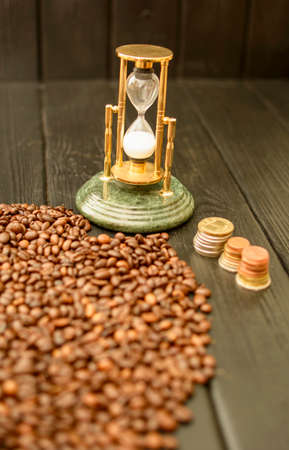 Delicious custard coffee in cups on the background of coffee beansの写真素材