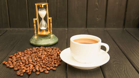 Delicious custard coffee in cups on the background of coffee beans