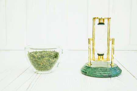 Green tea in a transparent cup on a light backgroundの写真素材