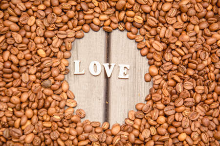 Background of delicious coffee beans close up