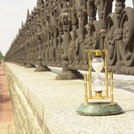 Beautiful hourglass stand against the background of beautiful nature