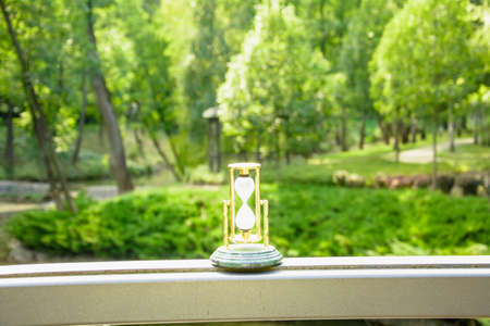 Beautiful hourglass stand against the background of beautiful nature
