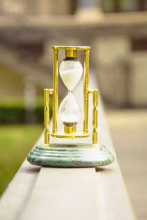 Beautiful hourglass stand against the background of beautiful nature