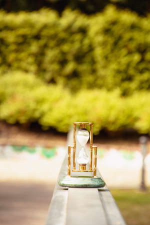 Beautiful hourglass stand against the background of beautiful nature