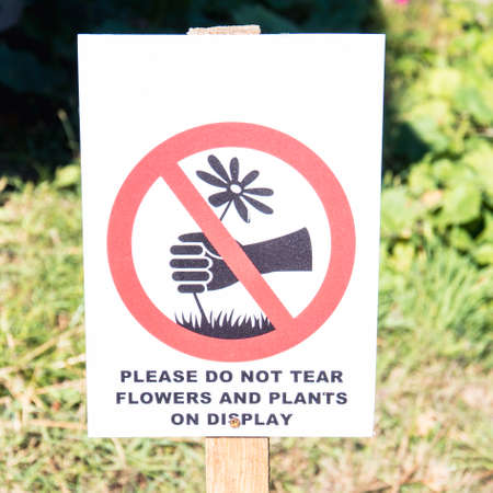 Conventional sign prohibiting picking flowersの写真素材