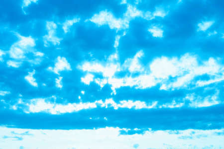 Beautiful airy sky with juicy young blue clouds