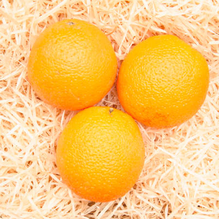 Oranges and freshly squeezed fruit juice on a beautiful backgroundの写真素材
