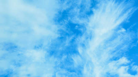 Beautiful blue spring sky in storm clouds