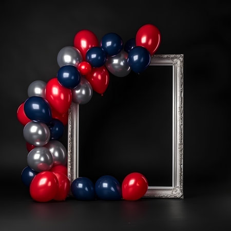 Silver frame with red, blue and white balloons on a black backgroundの素材