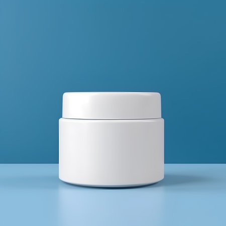 White cosmetic cream jar on blue background. 3d render illustration.の素材