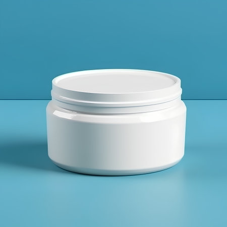 White cosmetic cream jar on blue background. 3d render illustration.の素材