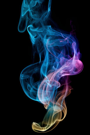 abstract colored smoke isolated on black background close-up for designの素材