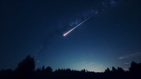A comet with a trail in the night sky. Shooting star.の素材