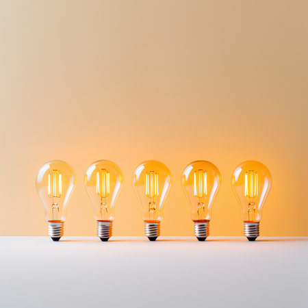 Group of light bulbs on a yellow background. 3D rendering.の素材
