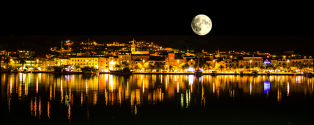 Moon over Makarska by night / Croatiaの写真素材