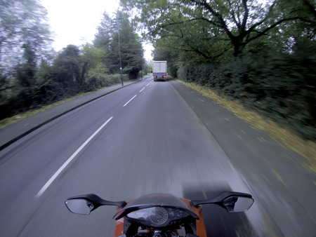 Motorcycle on wrong side on the road in the UK